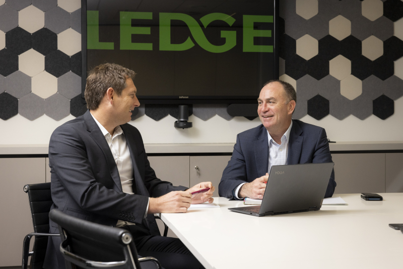 Isaac Hough and Brad Spencer from Ledge, having a meeting in the boardroom.