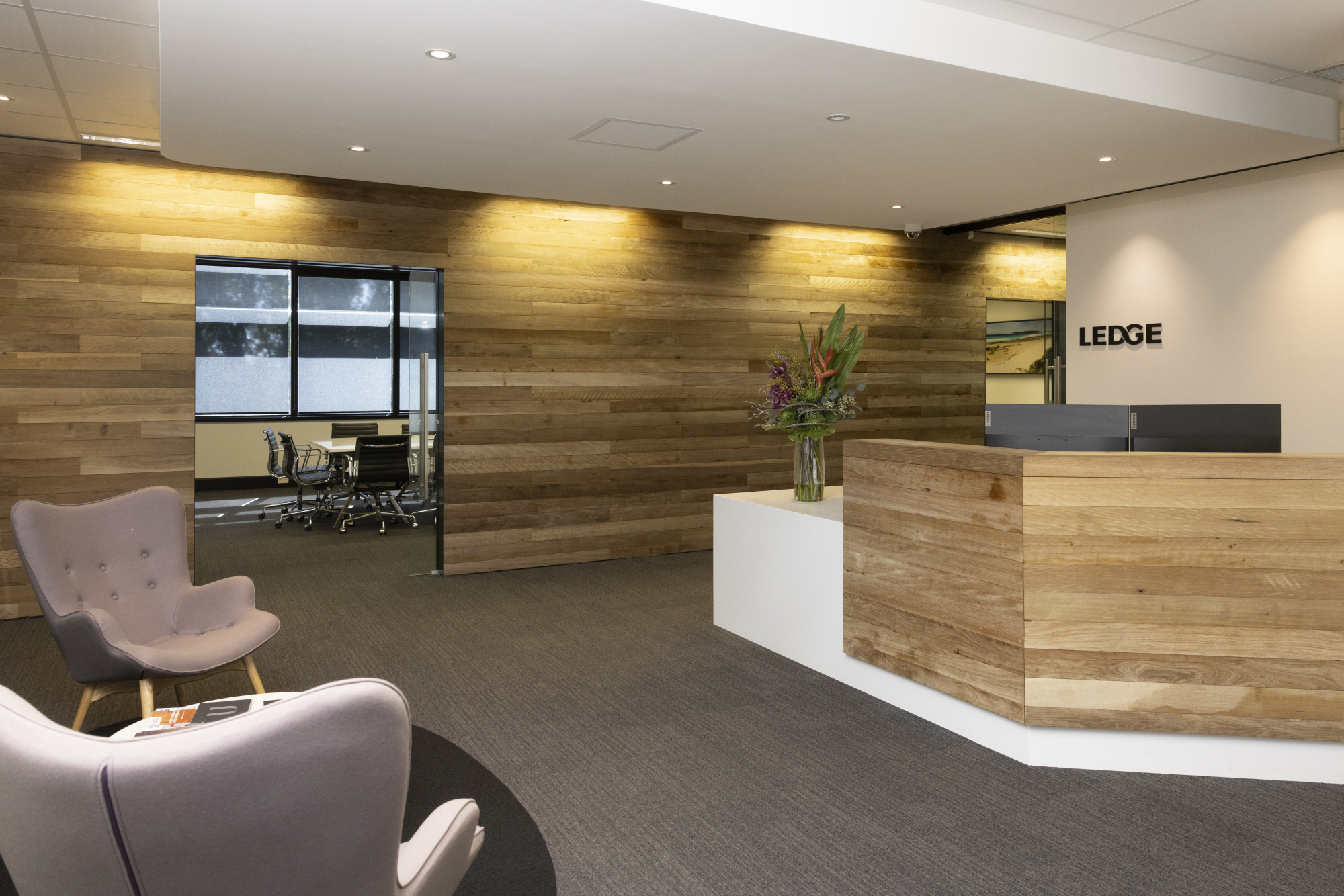 Ledge office foyer showing couches and front desk.
