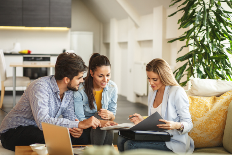 Couple having a meeting to discuss their home loan finance.