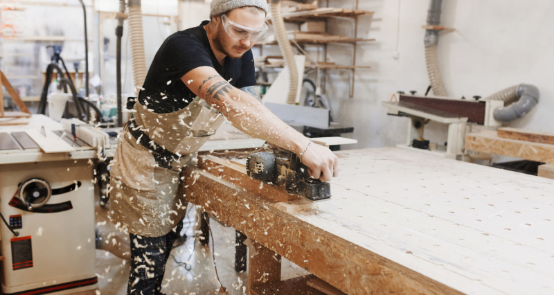 Carpenter working in their workshop.