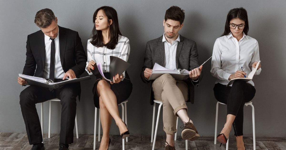 WA economic outlook for 2022 1 four people waiting to have a job interview