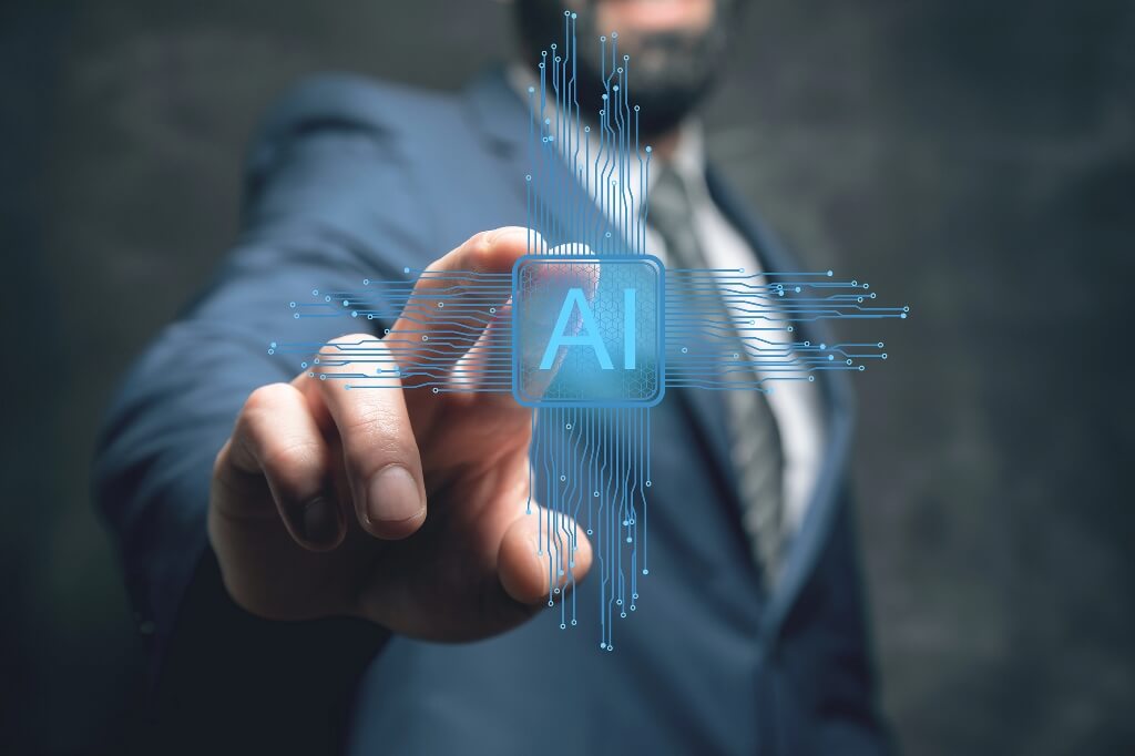 A man touching an AI sign thinking about how AI can help your business. 